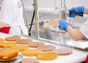 [freepicdownloader.com]-decorating-cakes-conveyor-confectionery-factory-large